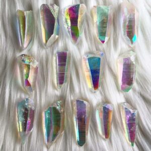 Angel Aura Quartz crystals with iridescent rainbow sheen used for aura cleansing and energy healing