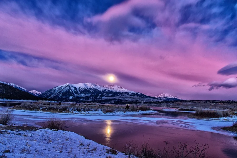 Psychic readings in Denver with mountain skyline and city lights