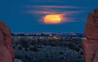 Supermoon rising over Garden of the Gods symbolizing powerful full moon energy Photo by Zach Vogel