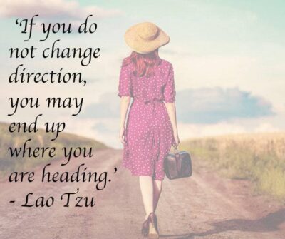 Woman walking forward on a dirt road with Lao Tzu quote about change and direction