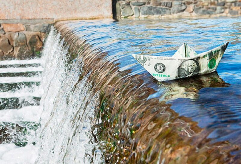 Money flowing to symbolize Psychic Lilly’s money and career psychic readings for prosperity and financial guidance 