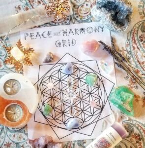 Calming crystal grid layout using lepidolite and fluorite for emotional balance and peace.