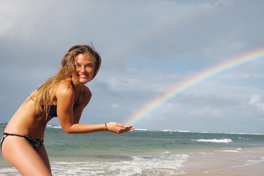 Rainbow Reiki Healing session image representing chakra alignment and aura cleansing through radiant light, sound, and color frequencies.