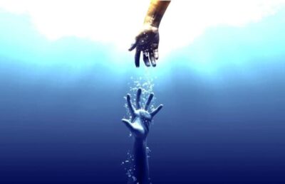 Hands reaching through light symbolizing emotional healing, hope, and recovery from depression.