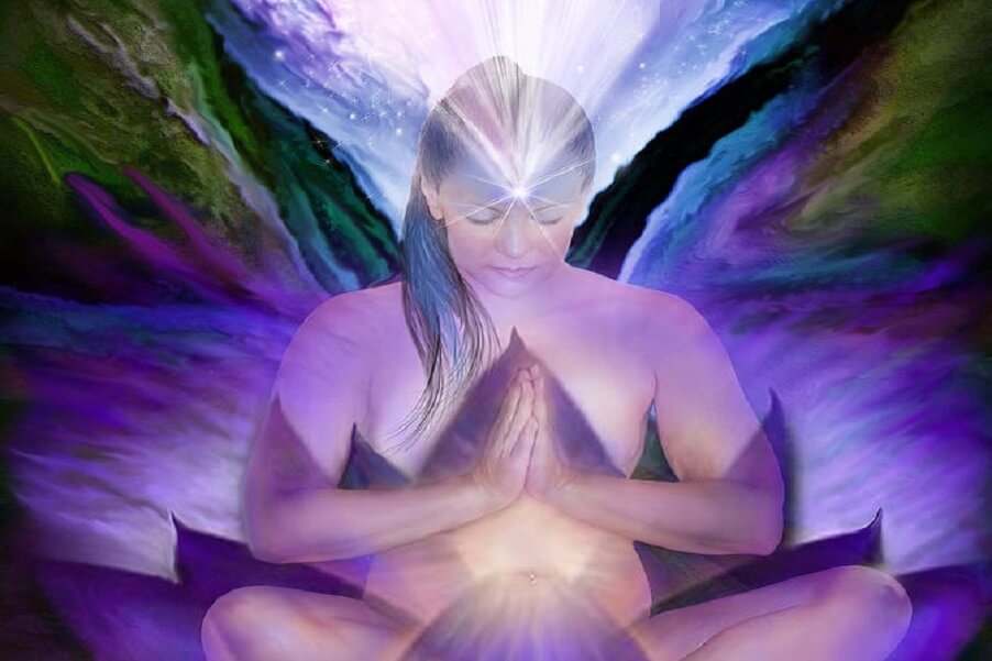 Spiritual woman meditating with third eye open, symbolizing healing and divine feminine awakening